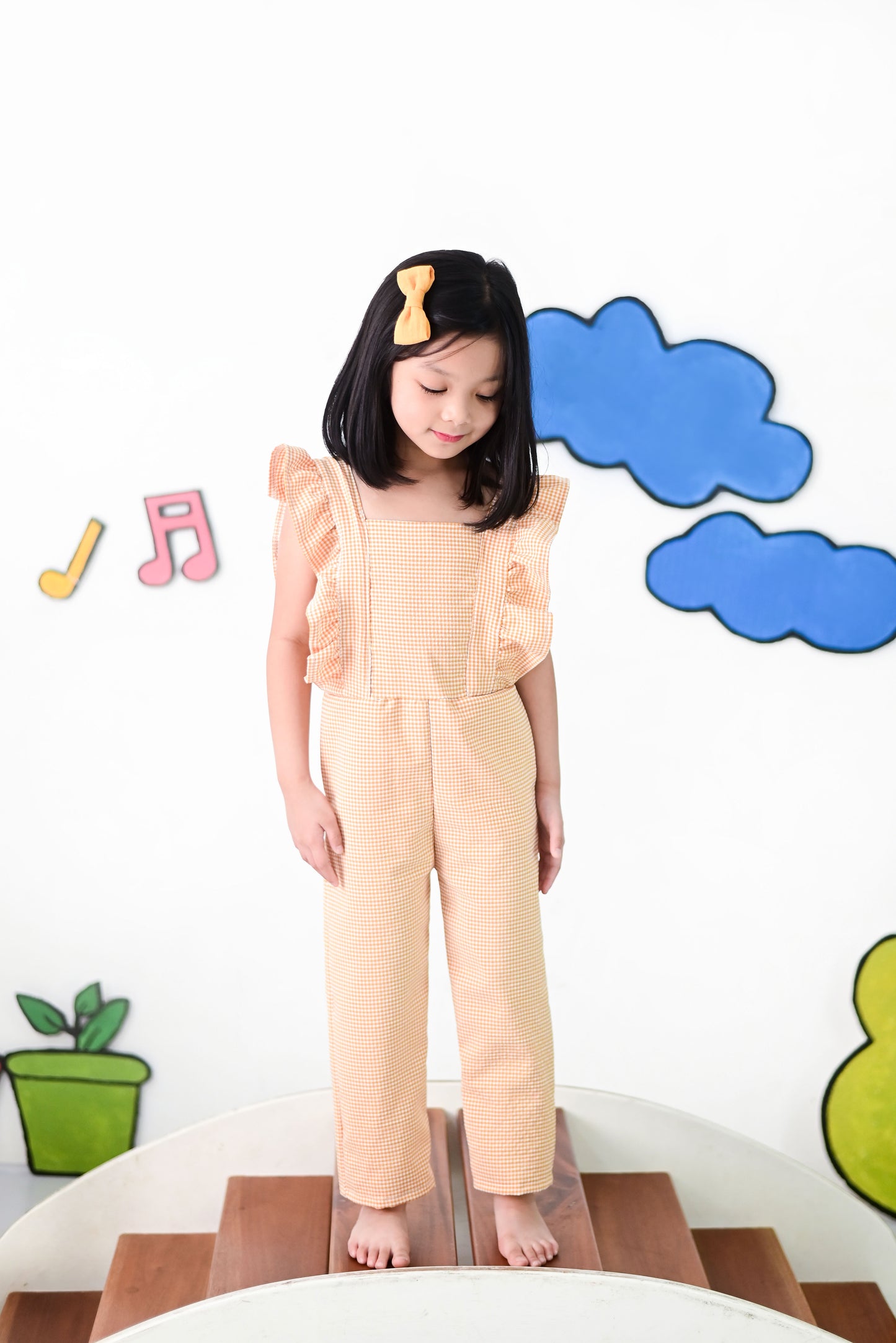 Luna Jumpsuit in Yellow-Orange Gingham