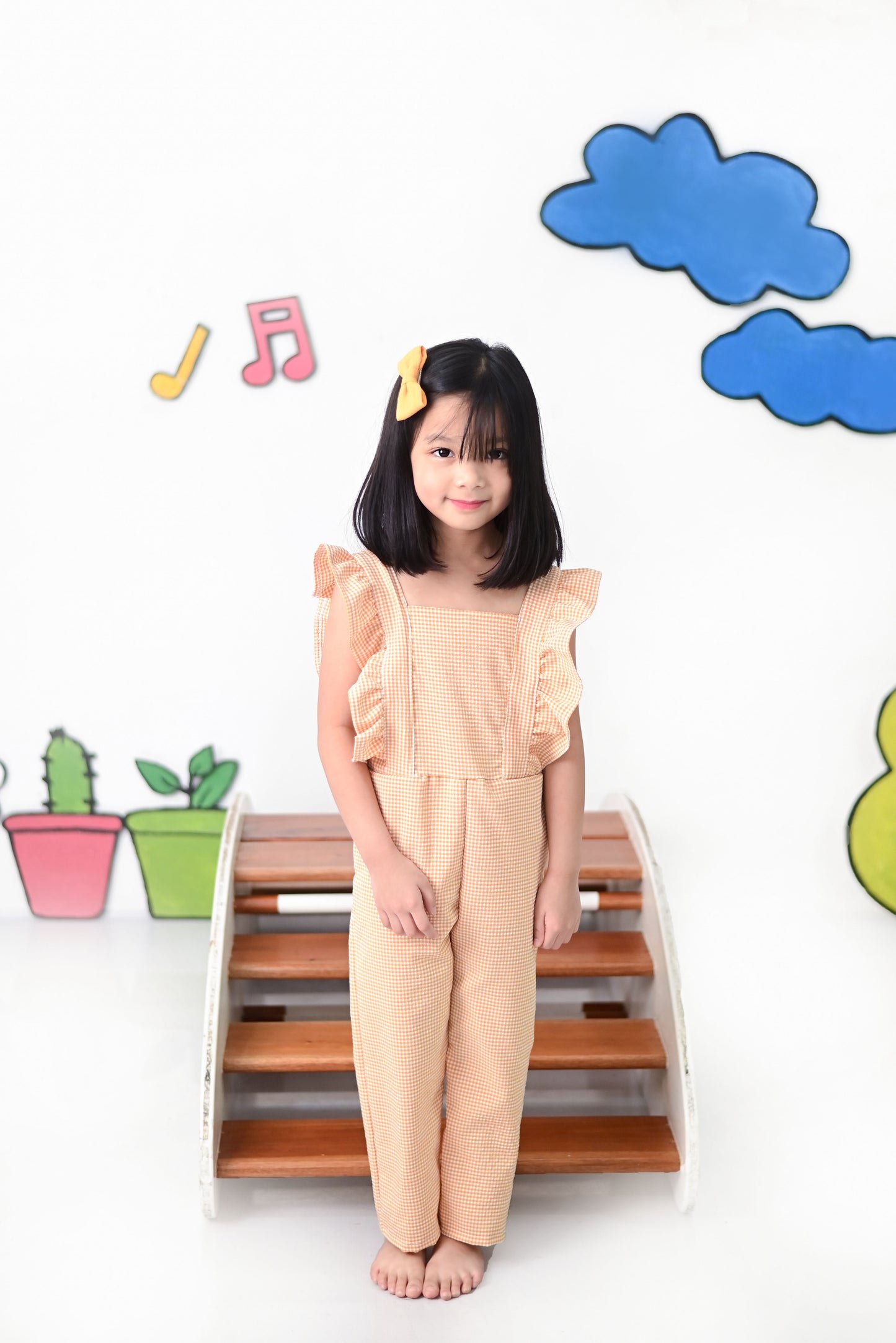 Luna Jumpsuit in Yellow-Orange Gingham